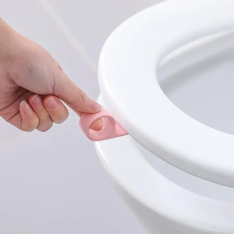 

Подъемный держатель для сиденья унитаза