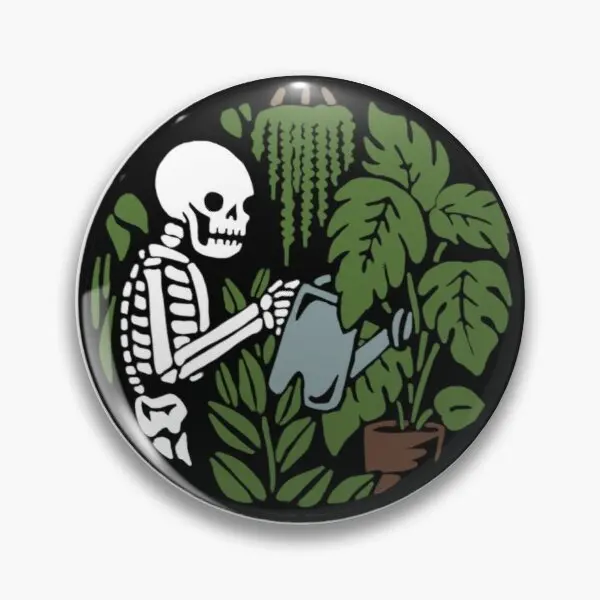 

Женская металлическая брошь в виде растений