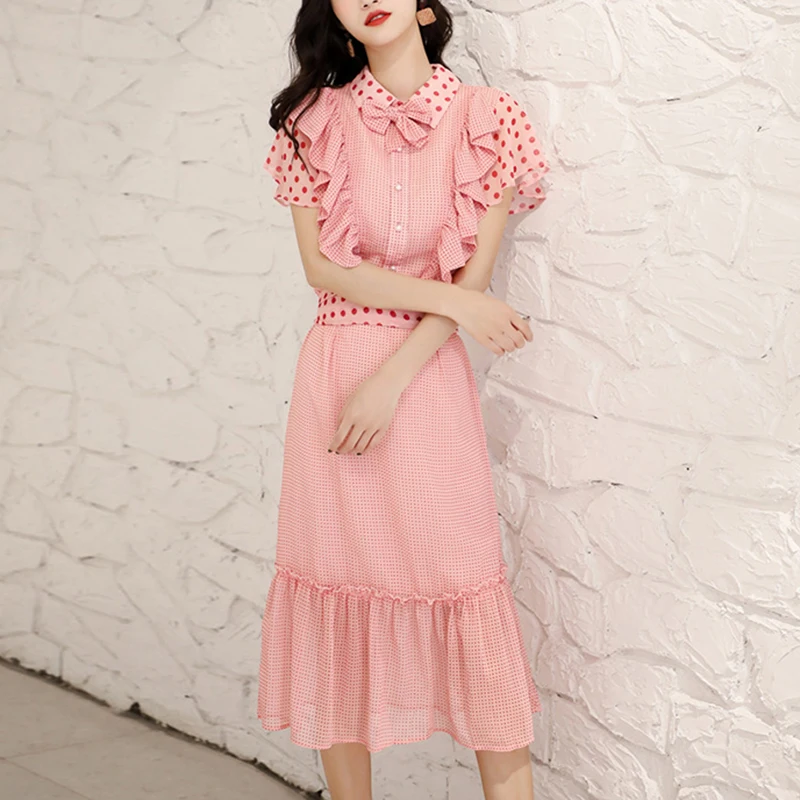 Возможно U розовое платье в горошек с бантом и оборками на рукавах коротким