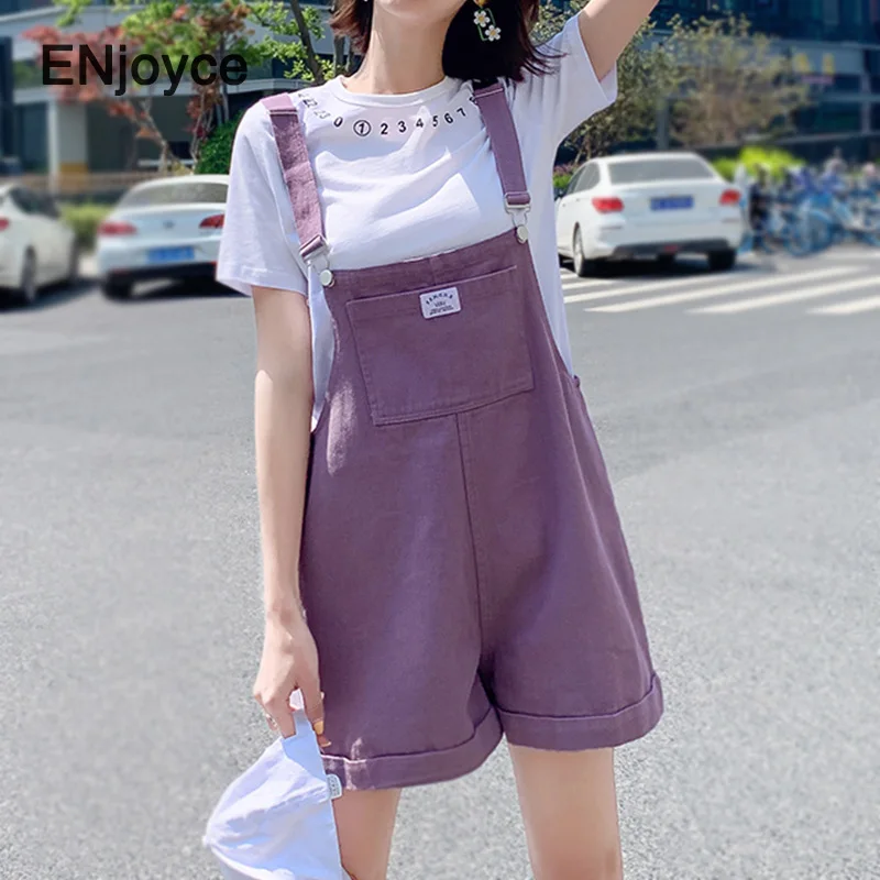 Женский джинсовый комбинезон повседневный зеленый на бретельках с большими