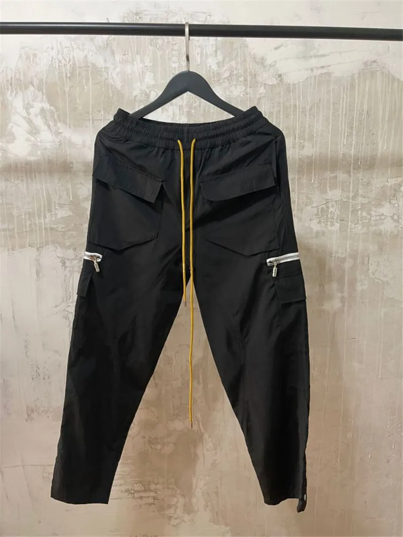 

RHUDE Overalls Men Women Best Quality Zipper Pocket RHUDE Cargo Pants Buttoned Hem Retro Multi Pockets Trousers