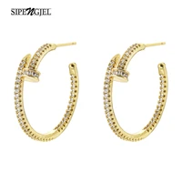sipengjel fashion geometric nail stud earrings punk creative simple big circle round piercing earrings for women jewelry