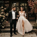 Booma блестящее кружевное свадебное платье в стиле бохо с завязками и бантом, Аппликации Свадебные платья с высоким разрезом, Длинные свадебные халаты трапециевидной формы с открытой спиной