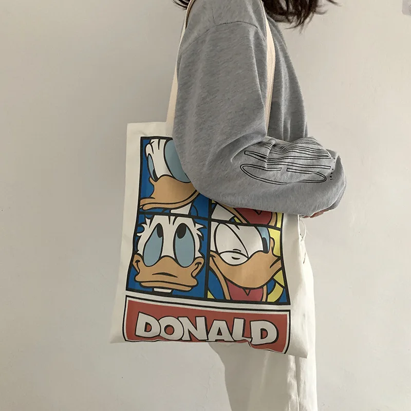 

Donald Duck Women's Canvas Tote Bags Korean Students Shoulder Cotton Cloth Shopping Bag Foldable Shopper Bag Handbag for Girls