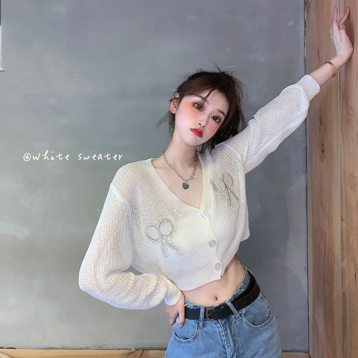 

Embroidered bow hollowed out knitted cardigan for women's wear