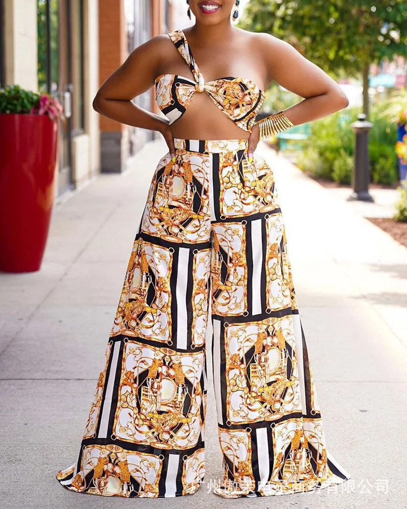 

Женский костюм-двойка с клетчатым принтом, осень 2021