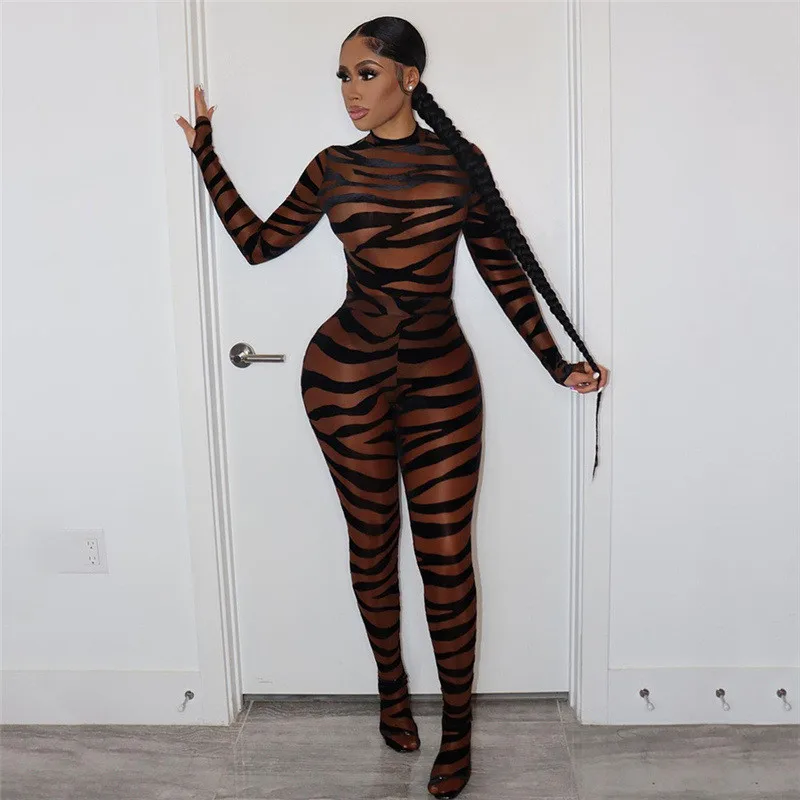 

2021 Winter Bodycon Jumpsuit Women Stripen Mesh See-through Turtleneck Bodysuit Sexy Street Fashion Female Playsuit Rompers Suit