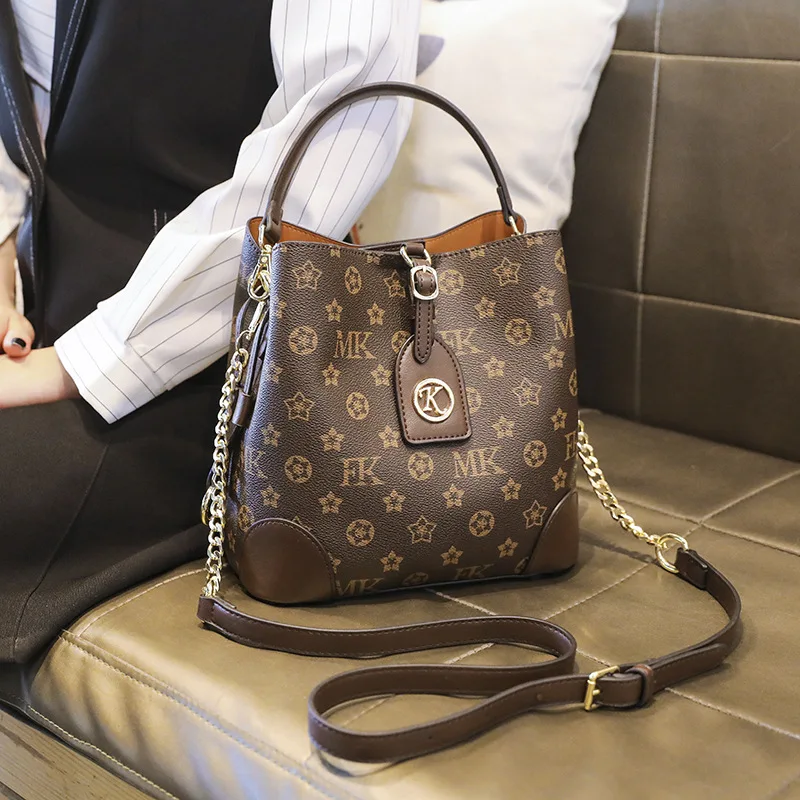 

Роскошная брендовая модная дабиопическая сумка-ведро из 100% натуральной кожи большой вместимости в стиле ретро сумка-мессенджер через плеч...