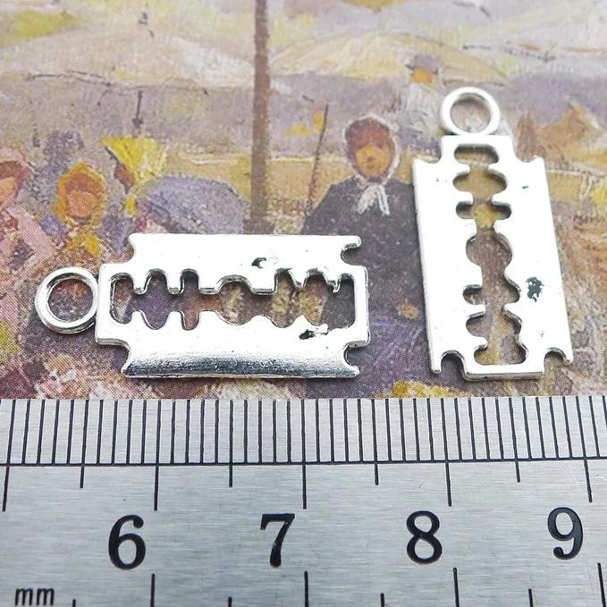 

Designer Charms 20 Pieces 25x12mm Antique Silver Color Blade Charms