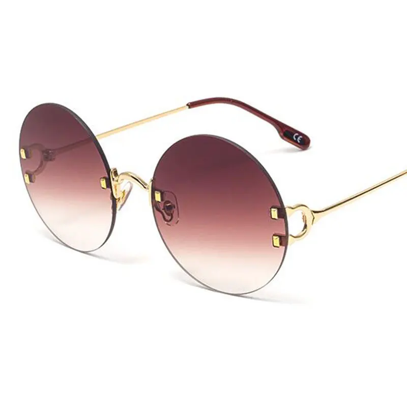 Затемненные Круглые Солнцезащитные очки без оправы 2020 Модные женские оттенки