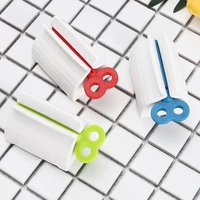 toothpaste dispenser tube squeezer tooth paste squeezer facial cleanser press rolling holder bathroom accessories for kids