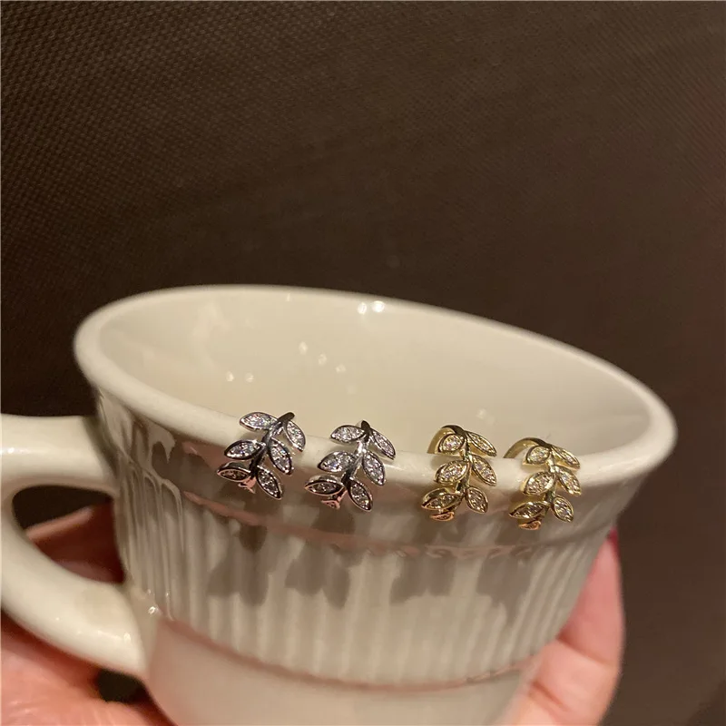 

Новый модный бренд нежные ювелирные изделия из золота 14к с покрытием листья клип серьги для женщин с цирконом ААА CZ серьги-манжеты
