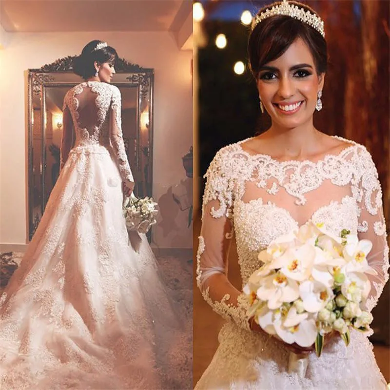 

2021 Romantic Lace Long Sleeves Wedding Dresses Bateau Neck Appliques Backless Beaded Ruched Sweep Train Bridal Gowns