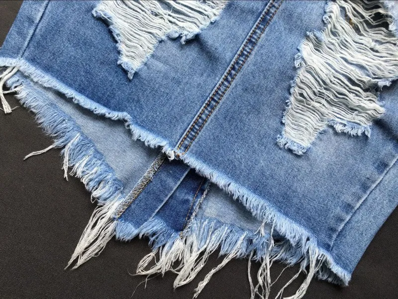 Юбка женская джинсовая Асимметричная повседневная короткая из денима с разрезом