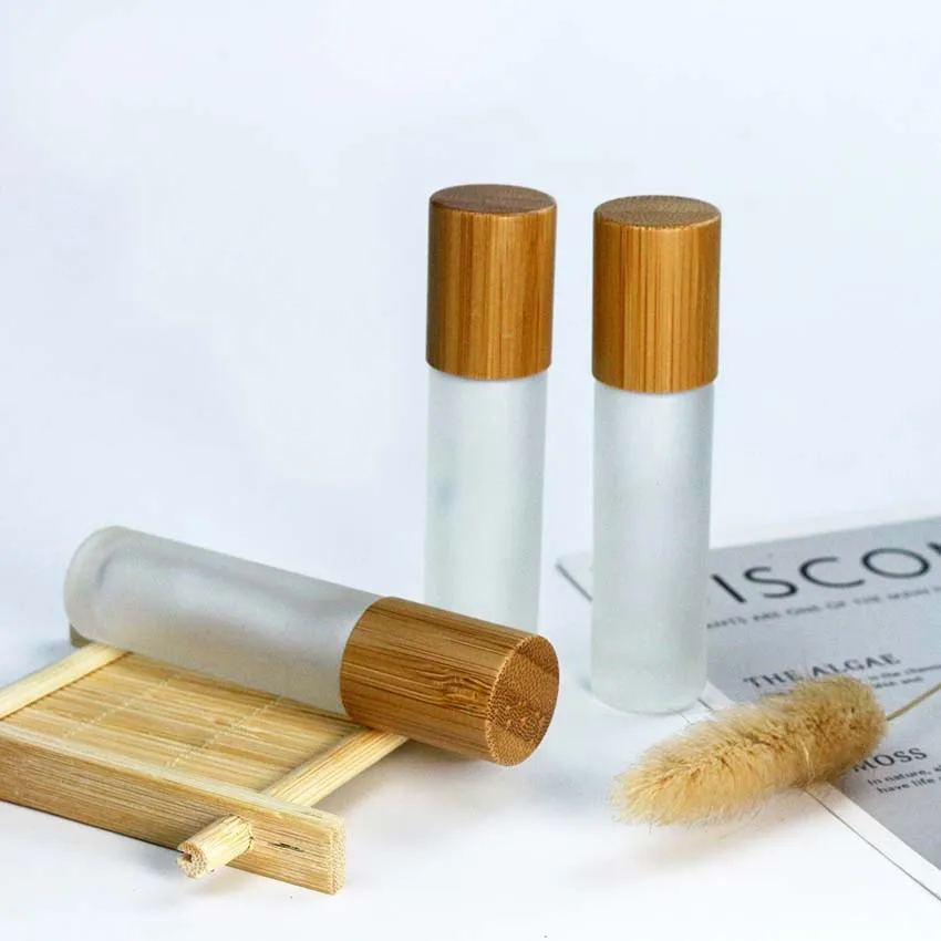 Wholesale Essence Oil Perfume 10ml 15ml Clear Transparent Roll On Glass Roller Bottle With Bamboo Lid  And Rollers