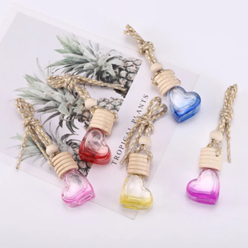 

New Car Air Freshener Perfume Glass Hanging Bottle Auto Oil Fragrance Diffuser Smell Odor Heart shaped for Home Office