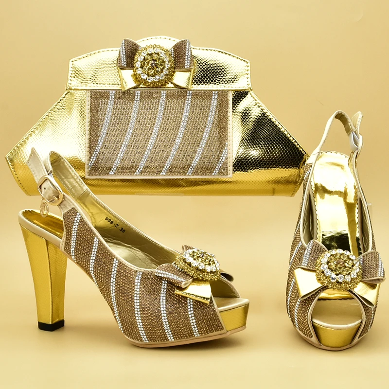 Новейшие туфли в африканском стиле и сумочка комплекте украшенные стразами