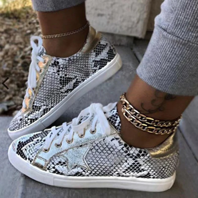 Женские кроссовки на плоской подошве белые Нескользящие из искусственной кожи