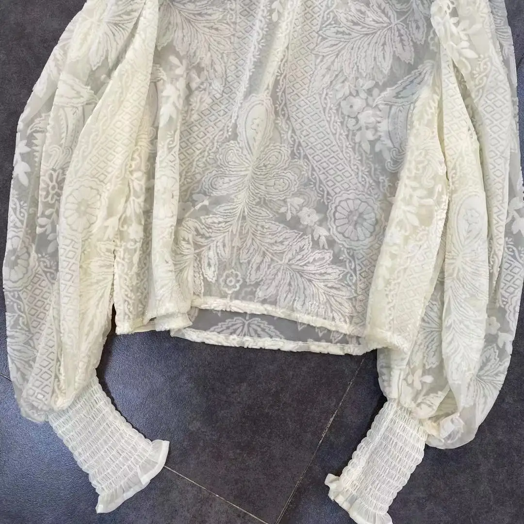 

ZCSMLL elastic stand-up collar long-sleeved embossed flower perspective little woman texture temperament shirt Spring 2021