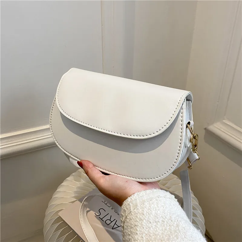 

2021 autumn women's messenger bag fashion saddle bag solid color simple one shoulder semicircle bag commuter women's bag