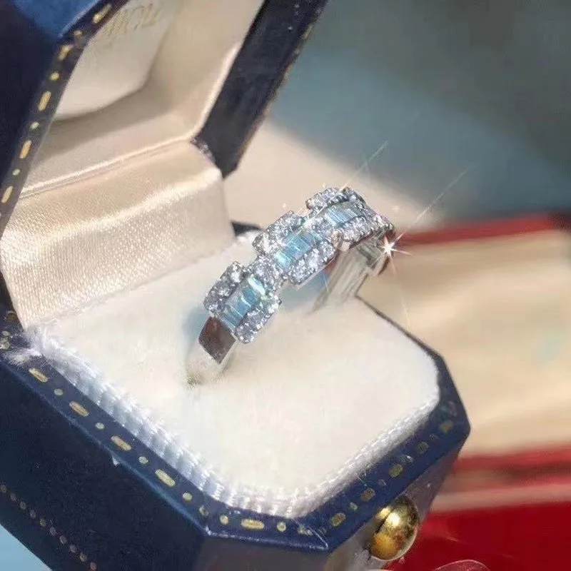 

Дизайнерский оригинальный новый роскошный темперамент с четырьмя когтями, инкрустированный кристаллами, Женское Обручальное кольцо Сваде...