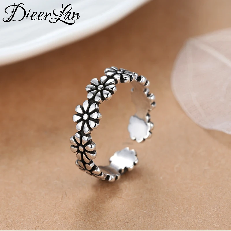 

Женское кольцо с цветами, из серебра 100% пробы