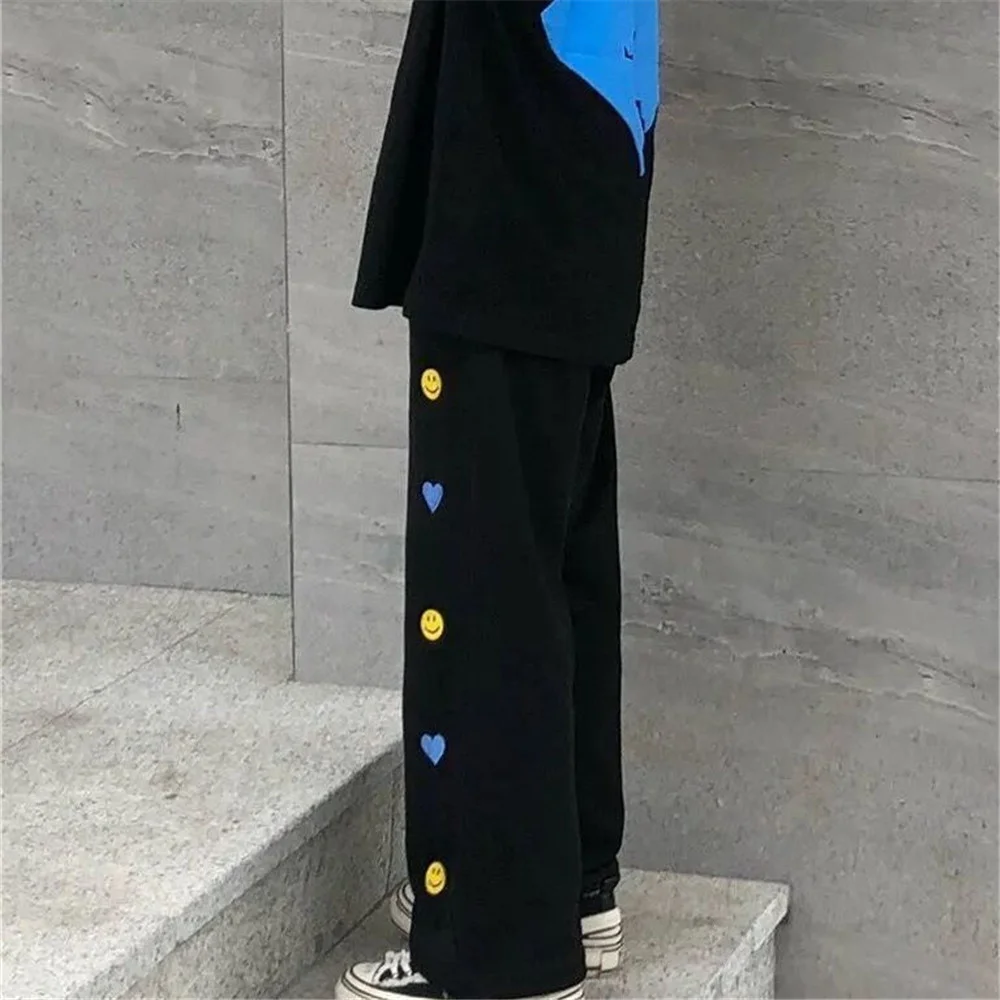 

Черные летние брюки с принтом, корейские брюки в стиле Харадзюку и панк, японские Свободные осенние брюки, модные смешные прямые женские брю...