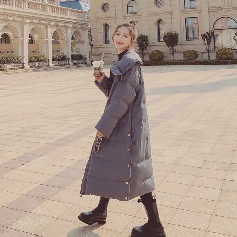 Женское зимнее пальто на белом утином пуху с капюшоном толстое средней длины