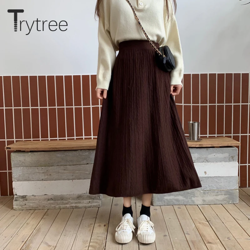 Женская трикотажная юбка в полоску до середины икры | одежда