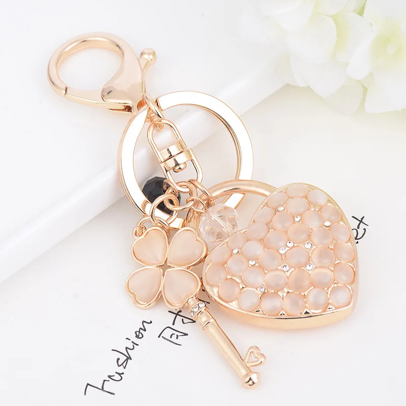 

Korea Best-Selling Love Car Keychain Pendant Fashion Four Leaf Clover Key Chain Lady Bag Wholesale Custom Keyring