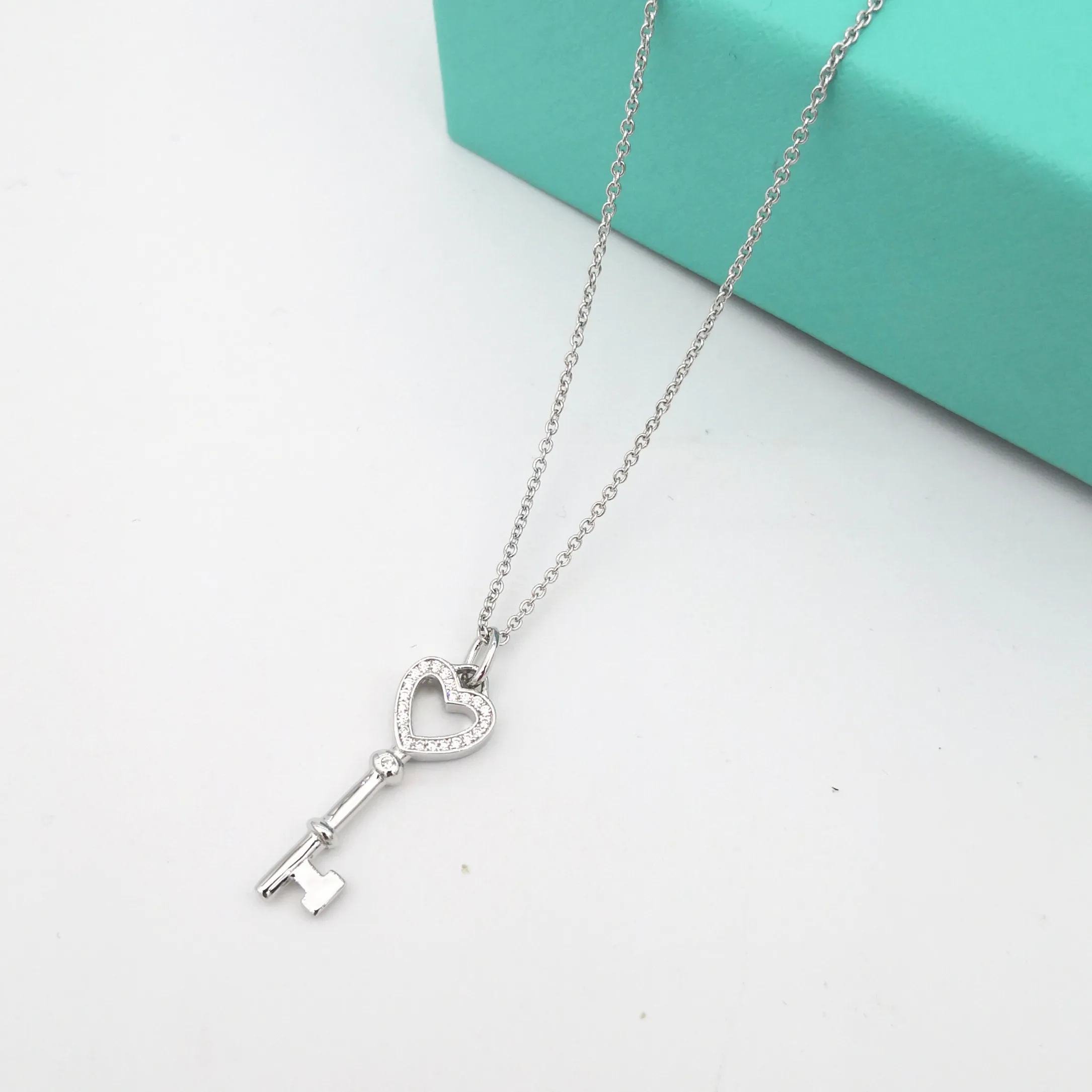 

Women's S925 Sterling Silver Classic Rose Gold Mini Edition Hollow Key with Zircon Pendant Necklace Sweater Chain