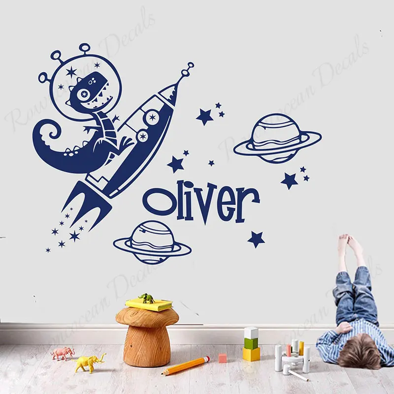 

Custom Name Cartoon Dinosaur Rocket Wall Sticker Space Planet Astronaut Home Decor Kids Boys Room Bedroom Nursery Decals 3B52