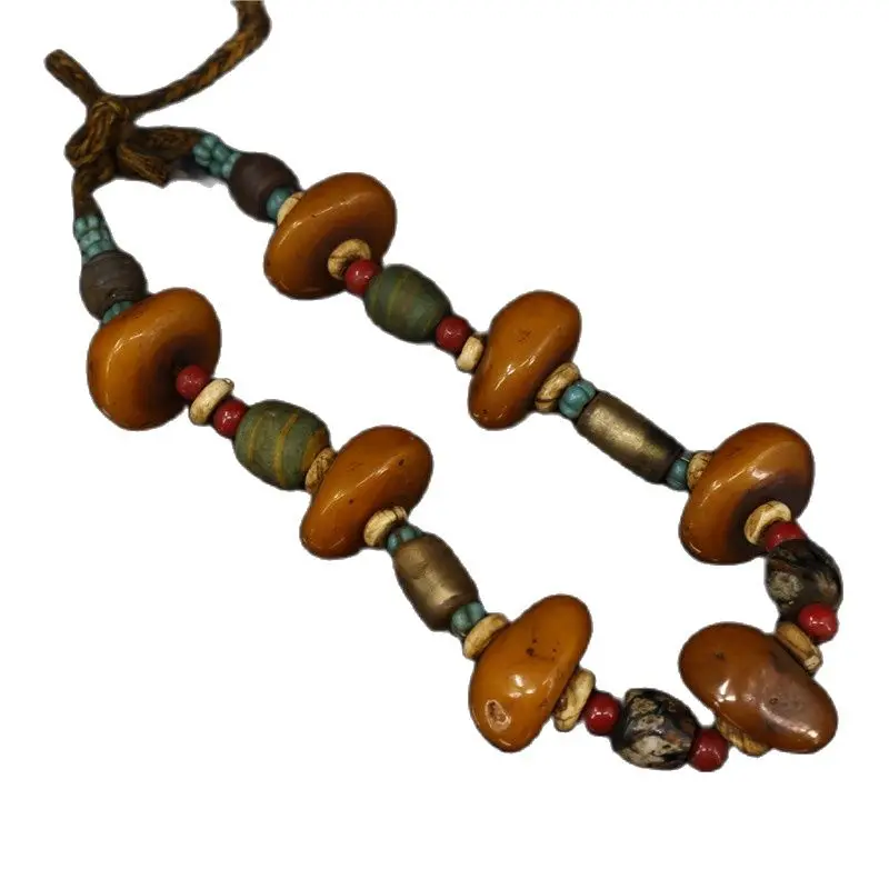 

Early collection of Tibetan amber old Duobao Necklace family collection