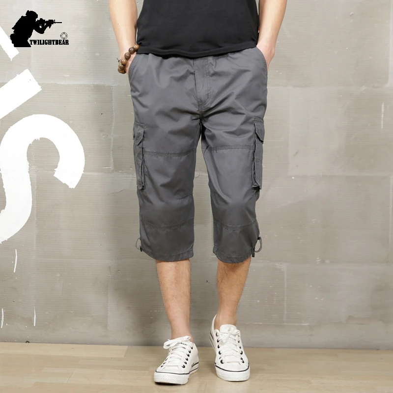 Летние повседневные брюки мужские укороченные оверсайз с несколькими карманами
