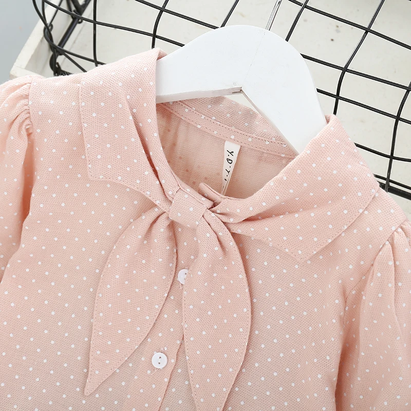 

Spring and autumn girls' shirts 2020 new girls baby wild simple wind wave dot lapel shirt children's cotton long-sleeved factory