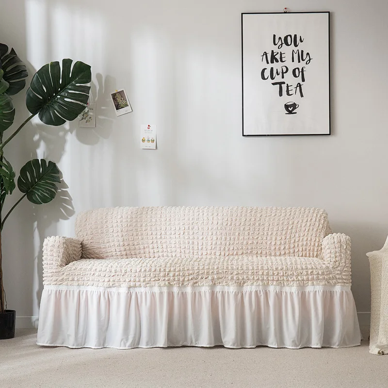 

Elegant Skirt and solid color stretch sofa set armchair in the living room