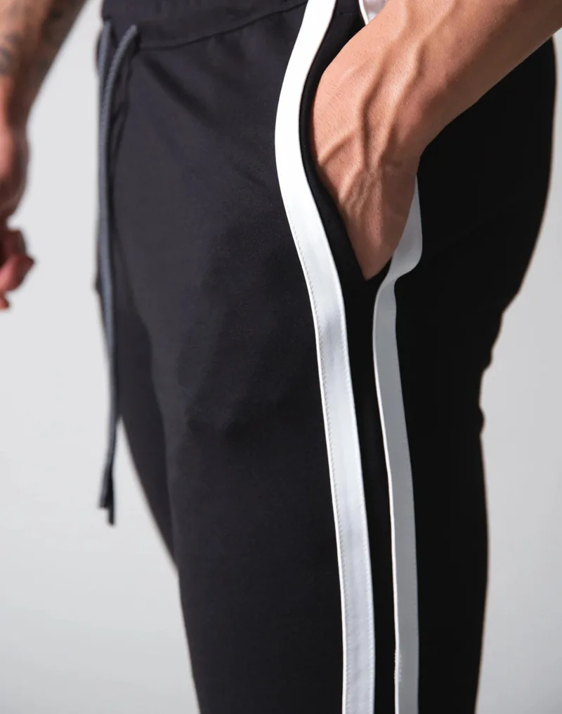 2020 men's tight trousers sports and leisure sweat-absorbent hit color zipper pants autumn new | Мужская одежда