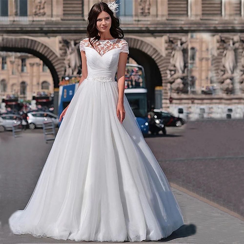 

2020 Charming Sweetheart Neck Sleeveless Tulle Wedding Dresses Robes De Mariée A Line Court Train Garden Bridal Gowns