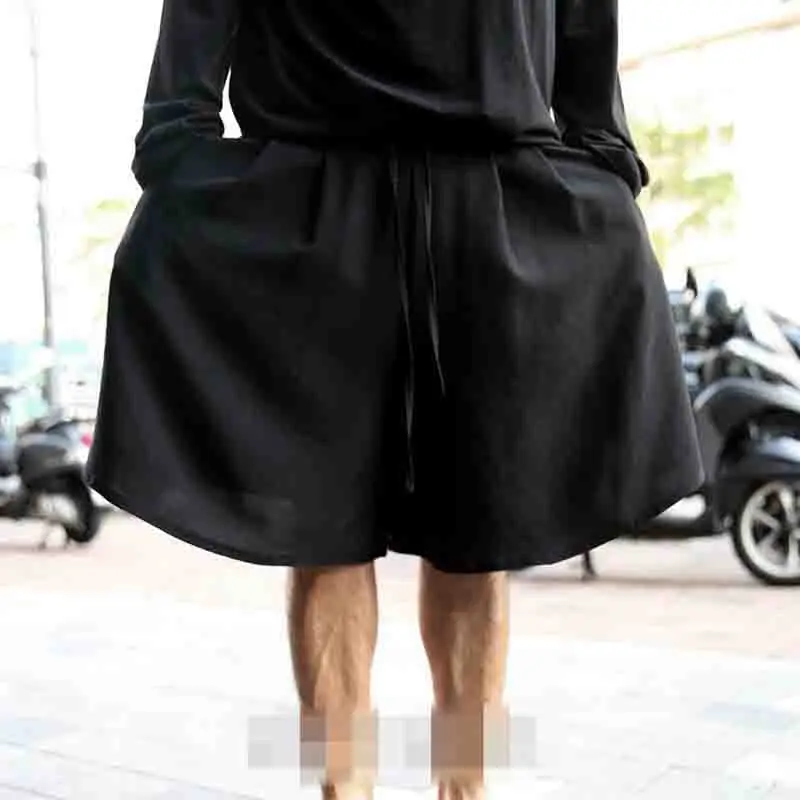 

Men's new solid color loose Korean fashion casual five point skirt pants pants large hip hop personality couple neutral