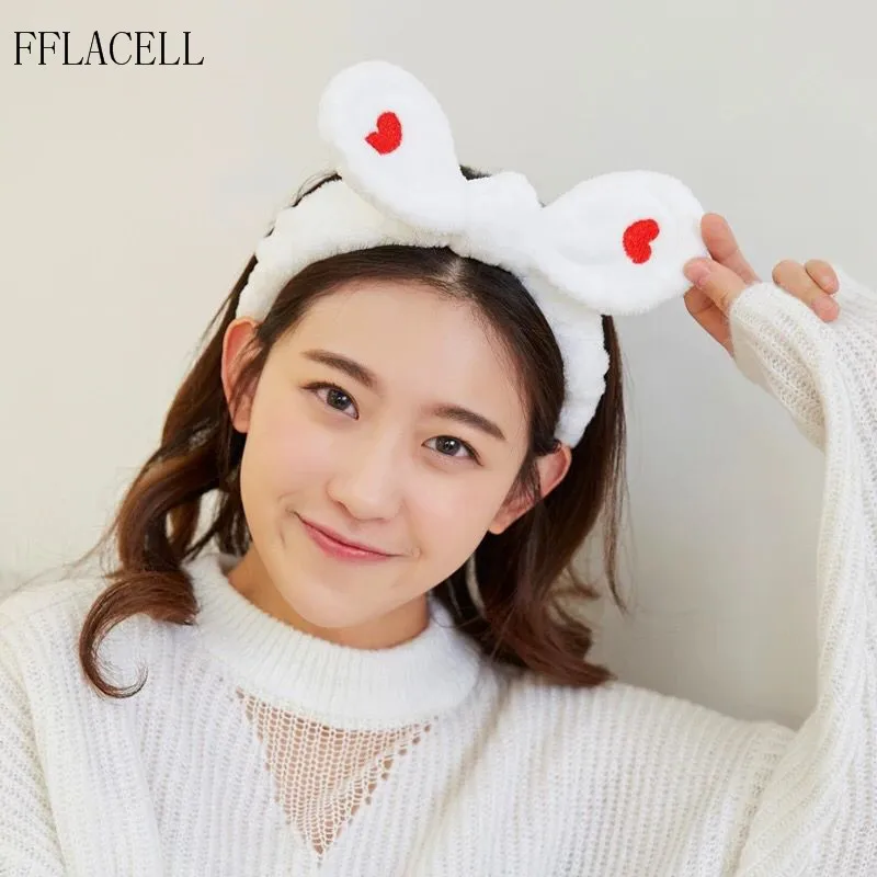 Повязка на голову из кораллового флиса с бантом и перекрестными лентами для