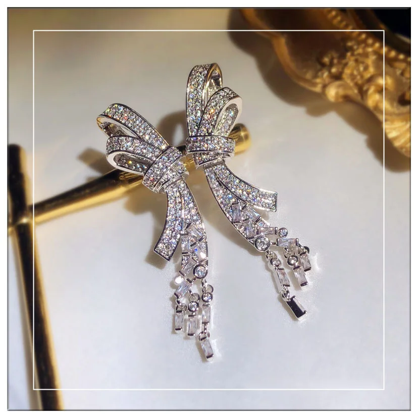 

Super flash zircon bowknot tassel pendant long earrings earrings female temperament wild silver needle crystal earrings