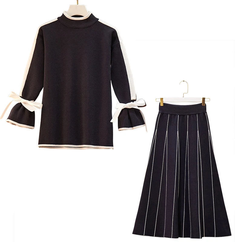 Облегающее женское платье большого размера осенне зимнее в полоску с длинным