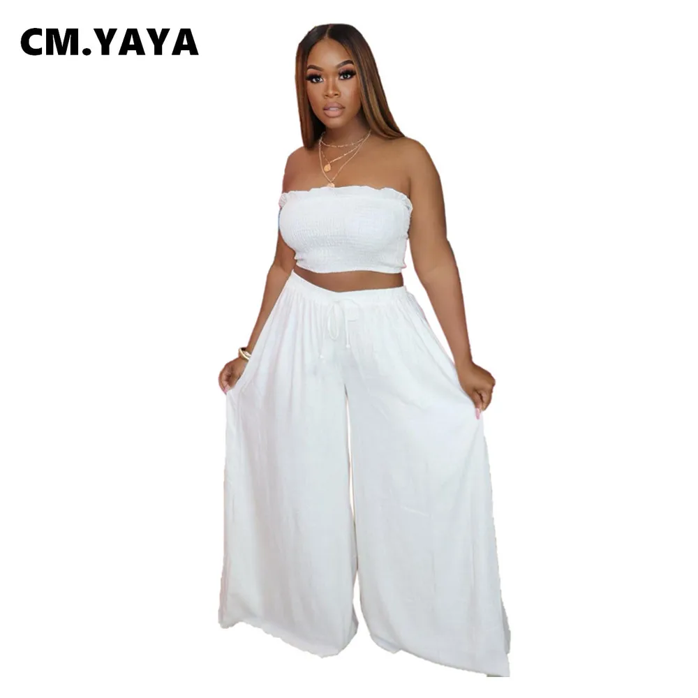 

Женский комплект из двух предметов CM.YAYA, однотонный укороченный топ без рукавов и без бретелек, свободные широкие брюки, пикантная модная ул...