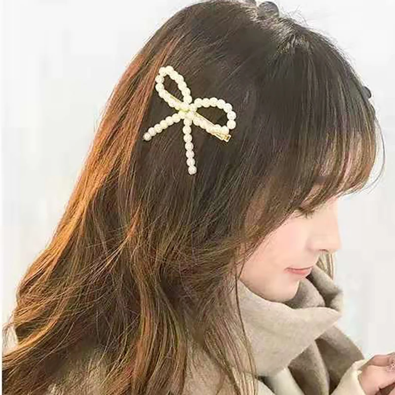 

Korean Bow White Pearl Hairpin The Same Style Is Fashionable And Versatile. Korean Style Hand-made Duck Beak Banger Side Clip