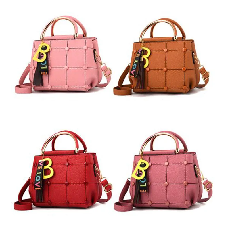 Сумка на плечо женская кожаная с верхней ручкой и кисточкой 9 цветов |