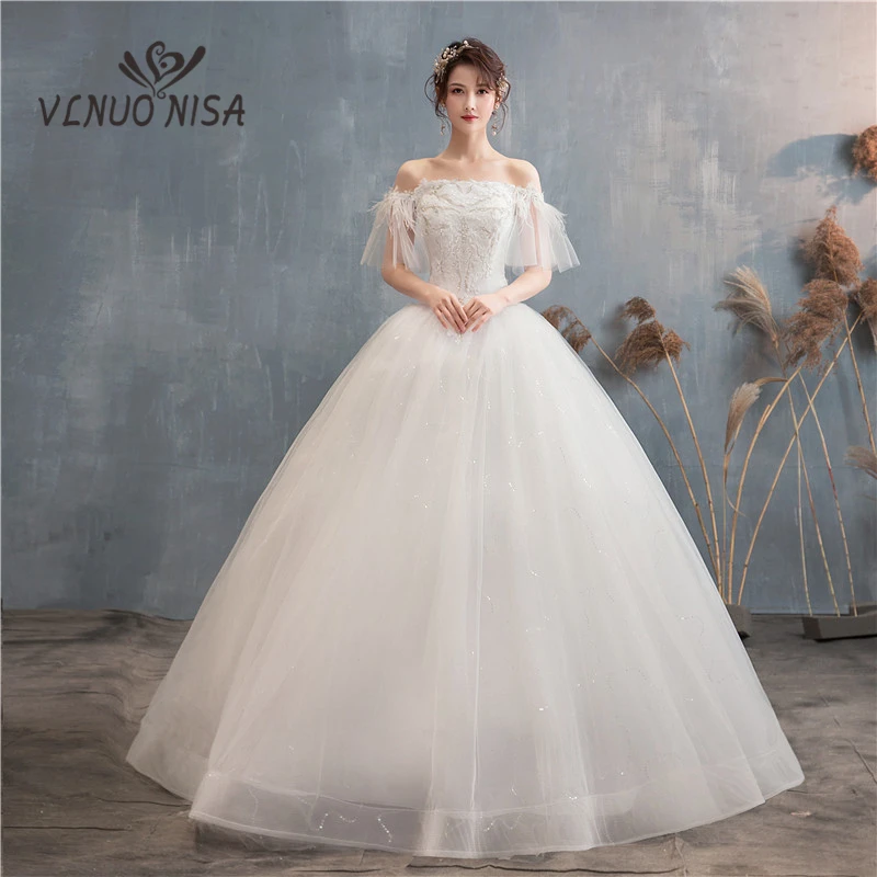 Новое Элегантное свадебное платье с вырезом лодочкой перьями и бисером вышивкой