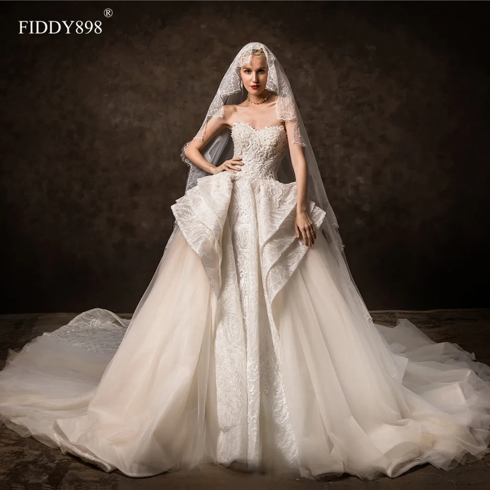 

Dubai Wedding Dresses 2020 Sweetheart Tiered Lace Beaded Ball Gown Bridal Dress Royal Wedding Gown Long Train robe de mariee