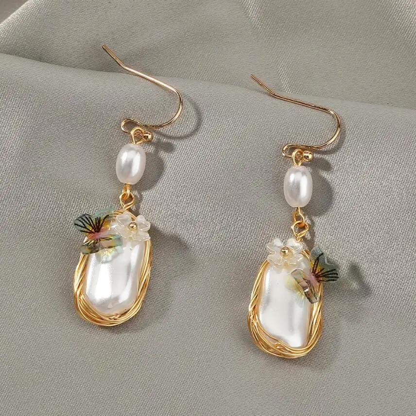

The Golden Trendy Earring Women`s Baroque Pearls Butterfly Fashion Drop Earrings