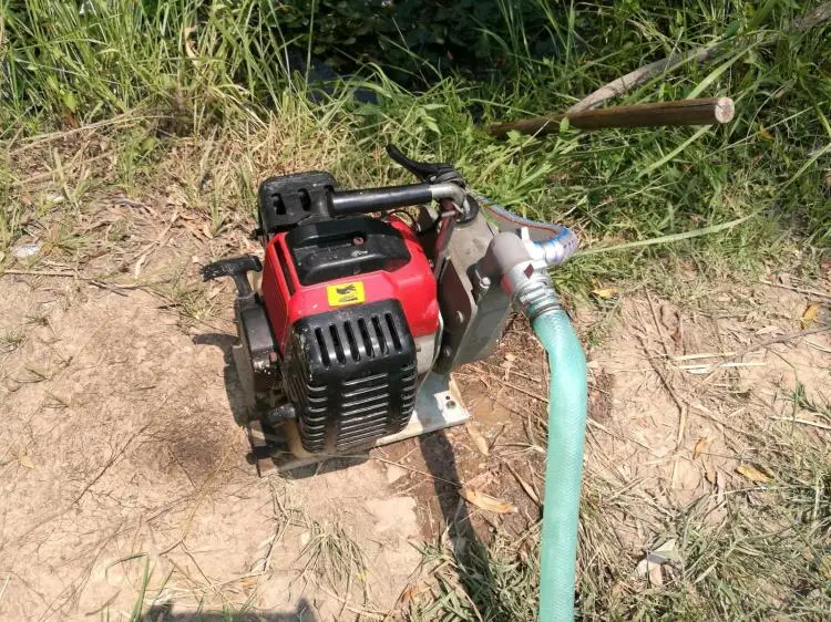 

Small 1/1.5 inch 2-stroke gasoline engine self-priming pump / municipal drainage aid / farm irrigation / garden spray
