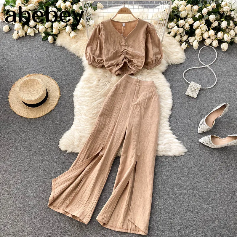 

Женский винтажный комплект из двух предметов, короткий топ с V-образным вырезом и пышными рукавами и широкие брюки с разрезом, цвет хаки/Белы...